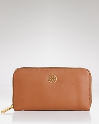 Sleek and chic, this Tory Burch wallet in luxe leather is filled with practical compartments. Sleek and chic, this Tory Burch wallet in luxe leather is filled with practical compartments.
