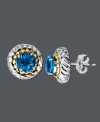 Stud earrings provide the perfect versatile accessory. These dazzling earrings feature a sterling silver setting with 14k gold rope edging that highlights a round-cut blue topaz (2 ct. t.w.). Approximate diameter: 3/8 inch.