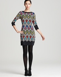 A cheerful print of kaleidoscope colors infuses this 60s-inspired Trina Turk dress with the mod touch that timelessly translates today. A cheerful print of kaleidoscope colors infuses this 60s-inspired Trina Turk dress with the mod touch that timelessly translates today.