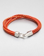 Boldly-hued, braided strands of fine leather are offset by a sterling silver clasp.LeatherSterling silverAbout 2½ diam.Made in the United Kingdom