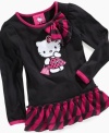 Out-and-about adorable look. She'll love strolling in the sweet style of this Hello Kitty ruffle top.