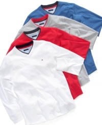 A timeless v-neck design. Tommy Hilfiger's simple cotton sweater will get miles of wear. A timeless v-neck design. Tommy Hilfiger's simple cotton sweater will get miles of wear.