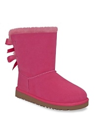 Suede ankle boots with genuine shearling lining will keep your feet in ultimate comfort. Functional elastic loop and button at side. Suede ankle boots with genuine shearling lining will keep your feet in ultimate comfort. Functional elastic loop and button at side.