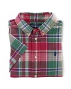 A tried-and-true button-front design is rendered in a vibrant madras plaid.