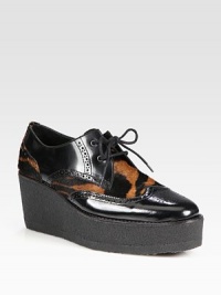 Classic leather oxford style heightened with a platform and exotic-printed calf hair. Rubber wedge, 2¾ (70mm)Rubber platform, 1¼ (30mm)Compares to a 1½ heel (40mm)Leather and calf hair upperLeather liningRubber solePadded insoleMade in Italy