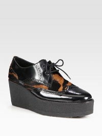 Classic leather oxford style heightened with a platform and exotic-printed calf hair. Rubber wedge, 2¾ (70mm)Rubber platform, 1¼ (30mm)Compares to a 1½ heel (40mm)Leather and calf hair upperLeather liningRubber solePadded insoleMade in Italy Classic leather oxford style heightened with a platform and exotic-printed calf hair. Rubber wedge, 2¾ (70mm)Rubber platform, 1¼ (30mm)Compares to a 1½ heel (40mm)Leather and calf hair upperLeather liningRubber solePadded insoleMade in Italy