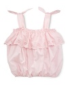 A relaxed bubble silhouette is crafted from airy woven cotton with sweet eyelet trim and tied straps for a decidedly girlie look.