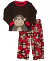 One little monkey jumping on the bed. Start his dream time with a little bit of fun in this comfy fleece shirt and pant pajamas set from Carter's.