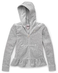 With rich peplum ruffles at the hem, shoulders and back, Juicy Couture's classic velour hoodie makes luxurious style a daily affair. With rich peplum ruffles at the hem, shoulders and back, Juicy Couture's classic velour hoodie makes luxurious style a daily affair.