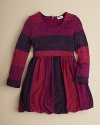 A ruffled bubble skirt and glittery stripe pattern add a certain elegance to Splendid Little's shimmery party dress.