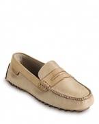 A classic driving shoe remixed with contrast construction and penny loafer detail.