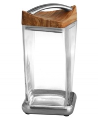 More than storage, the Twist canister combines luxe materials and distinct Nambe style to keep food and kitchens at their best. An acacia wood lid seals in freshness, lending chic contrast to glistening metal and glass. Designed by Neil Cohen. More than storage, the Twist canister combines luxe materials and distinct Nambe style to keep food and kitchens at their best. An acacia wood lid seals in freshness, lending chic contrast to glistening metal and glass. Designed by Neil Cohen.