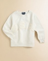 Crafted from ultra-cozy fleece in a classic crewneck silhouette, this essential sweatshirt is adorned with stitched-on USA for a time-honored, patriotic appeal. Crewneck with V-insetLong sleevesPullover styleRibbed cuffs and hem87% cotton/13% polyesterMachine washImported