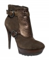 GUESS by Marciano's Risa booties are an experiment in style. A detailed front vamp buckles on at the ankle and underneath the foot for a look that's truly unique.