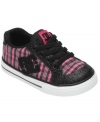 Pretty plaid on these Chelsea sneakers from DC Shoes add an adorable twist to her street style.