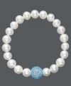 A traditional design receives a sparkling touch. Cultured freshwater pearls (8-9 mm) in shimmery white hues adorn this chic stretch bracelet, while a baby blue crystal fireball adds extra glamour. Approximate diameter: 3-1/2 inches.