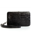 Fab meets function in this posh, croc-embossed wristlet case from Kenneth Cole Reaction that discretely stashes a music player or phone. Provides portal for ear buds so can grove on-the-go, and separate  compartments let you bring along cards, cash, coins and ID.