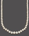 Graduated cultured freshwater pearls (6-9.5 mm) add pleasing intrigue to any look. Necklace set in 14k gold. Approximate length: 18 inches.