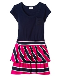 Ruffles and stripes bring a carefree charm to her summery wardrobe. Ruffles and stripes bring a carefree charm to her summery wardrobe.