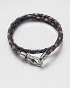 A richly-hued braided leather bracelet perfect for layering and wrap around styling.LeatherAbout 3 diam.Spring claspMade in Italy