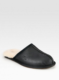 Warm, comfortable leather slip-ons are fully lined in sheepskin, which naturally wicks away moisture and helps keep feet dry.Leather upperLeather liningPadded insoleRubber soleImported Warm, comfortable leather slip-ons are fully lined in sheepskin, which naturally wicks away moisture and helps keep feet dry.Leather upperLeather liningPadded insoleRubber soleImported