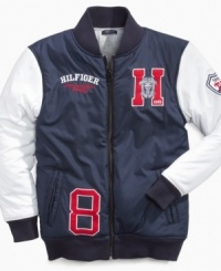He'll hit a home run every time he slips into this athletic baseball jacket from Tommy Hilfiger. He'll hit a home run every time he slips into this athletic baseball jacket from Tommy Hilfiger.