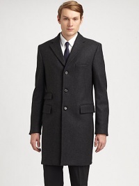 Single-breasted top coat with contrast collar is the ultimate completion of your formal wardrobe, elegantly woven in a luxurious wool blend.Button-frontChest welt, waist flap pocketsRear ventAbout 40 from shoulder to hem85% virgin wool/12% polyamide/2% elastaneDry cleanMade in Italy