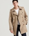 No need to wish the rain away with this handsome trench from Diesel, outfitted with thoroughly modern details that stay true to the classic double-breasted silhouette.