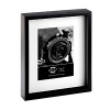 Display a treasured photograph in Prinz's black pine wood frame. White beveled matting highlights one 5 x 7 image while the shadow box design adds gallery-like impact.