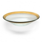 Ancient Italian relics are translated into an abstracted modern design in this handcrafted dinnerware and serving collection from designer Ann Morhauser. This handpainted, 24 karat gold collection tastefully accentuates everything from sleek, modern designs to delicate porcelain, or can be used on its own as a dramatic statement.
