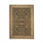 Modeled after the world's most prized antique textiles, this luxuriant Karastan rug lends opulence and heirloom beauty to your home. Surrounded by a light border to add depth and contrast, the stylized pattern depicts lush flora and curvilinear accents. First introduced in 1928, the Original Karastan Collection established the highest standard for traditional Oriental machine woven rugs.