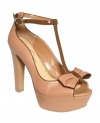 Cappuccino leather provides the cutest contrast for these girly nude platforms. Jessica Simpson's Jiamma pumps are chunky with a pretty bow at the toe and a darling contrasting t-strap.