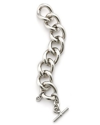 Simple and sophisticated. MICHAEL Michael Kors' link and toggle bracelet adds a stroke of silver polish to everyday looks. Simple and sophisticated. MICHAEL Michael Kors' link and toggle bracelet adds a stroke of silver polish to everyday looks.