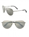 A classic aviator crafted in sleek, lightweight metal exudes timeless style and sophistication. Available in shiny silver frames with smoke flash lenses.Metal100% UV ProtectionMade in Italy
