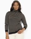 The ultimate in understated elegance, a chic turtleneck is crafted from soft combed cotton and accented with classic stripes.