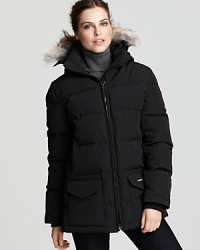 Canada Goose's low hip-length parka provides ultra protection and warmth. The hood boasts a removable coyote fur ruff and Velcro® collar for versatility. Canada Goose's low hip-length parka provides ultra protection and warmth. The hood boasts a removable coyote fur ruff and Velcro® collar for versatility.
