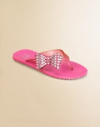 Both elegant and easy, simple jelly flip flops are adorned with rhinestone-studded bows on one side of the strap.Composite rubber upperSide bow with rhinestonesComposite rubber soleImported