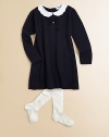 Simply beautiful in a cotton and cashmere blend with a Peter Pan collar, front button detail, sweet bow and scalloped trim.Peter Pan collarLong sleevesBack buttonsScalloped hem and cuffs92% cotton/8% cashmereDry cleanImported Please note: Number of buttons may vary depending on size ordered. 