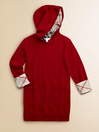The luxury of pure cashmere in a simple, versatile form, to wear as a tunic or as a dress, delightfully trimmed with those familiar woven checks.Hood with woven lining and ribbed trimPullover stylingLong sleeves with wide woven cuffsPatch pocketsRibbed hemCashmereDry cleanImported The luxury of pure cashmere in a simple, versatile form, to wear as a tunic or as a dress, delightfully trimmed with those familiar woven checks.Hood with woven lining and ribbed trimPullover stylingLong sleeves with wide woven cuffsPatch pocketsRibbed hemCashmereDry cleanImported