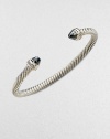 From the Cable Collection. Two beautifully, faceted hematite stone caps accented with dazzling diamonds on a sterling silver cable cuff. HematiteDiamonds, .2 tcwSterling silverDiameter, about 2½Slip-on styleImported 