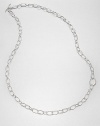 From the Scultura Collection. Links large and small create a look of elegant simplicity in this open chain necklace of polished sterling silver.Sterling silverLength, about 36Toggle closureImported