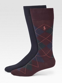 A distinguished set of solid and classic argyle patterned socks finished with embroidered signature polo detail.Pack of 2Mid-calf heightCotton/polyester/nylon/rubber/spandexMachine washImported A distinguished set of solid and classic argyle patterned socks finished with embroidered signature polo detail.Pack of 2Mid-calf heightCotton/polyester/nylon/rubber/spandexMachine washImported
