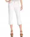 Style&co. puts a twist on white denim capri pants with edgy studs and a touch of rhinestone sparkle! Extra tummy control ensures a smooth silhouette, too.