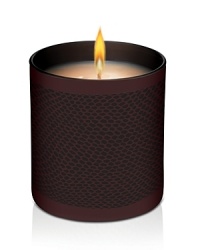 Set the holiday mood with Laura Mercier's limited-edition Signature Candles. In 7.5 oz. chocolate brown glass tumblers, each candle features Laura's signature style with a tone-on-tone snakeskin inspired deco. Laura Mercier Crème Brûlée Signature Candle brings a warm and decadent combination of gourmand ingredients, reminiscent of a French patisserie, to your home. Delicious notes of warm caramel, spun sugar and French vanilla bean emit a sensual and enchanting scent to fill your home during the holidays. Burn time: 55 hours.