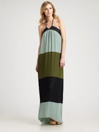 The dynamic trend of the season, colorblocking, seamlessly combines with a timeless, pleated maxi silhouette for a flawless finish.Halter ties at neckAllover pleatsSide zipperAbout 40 from natural waistPolyesterDry cleanImported Model shown is 5'10½ (179cm) wearing US size 4. The dynamic trend of the season, colorblocking, seamlessly combines with a timeless, pleated maxi silhouette for a flawless finish.Halter ties at neckAllover pleatsSide zipperAbout 40 from natural waistPolyesterDry cleanImported Model shown is 5'10½ (179cm) wearing US size 4.