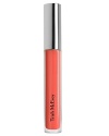 This classic, radiant formula combines sexy color and shine with a luminous finish.* Precision brush tip* Non-stick wear* Never dryingUsing the brush tipped applicator sweep gloss over the lips. For soft definition, line and blend your lips with Trishs Lip Liner before and after gloss application.