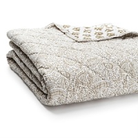 Inspired by old Indian latticework screens, this detailed quilt from JR by John Robshaw reverses to a block floral print in soft clay. Inspired by old Indian latticework screens, this detailed quilt from JR by John Robshaw reverses to a block floral print in soft clay.