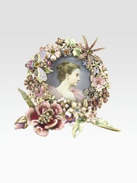 Carefully placed Swarovski crystals lend an opulent, heirloom-quality floral touch to this charming little frame that's handcrafted in brass ox-plated pewter. From the Mille Fiore Collection 5% of the retail price will be donated to the Breast Cancer Research Foundation Accommodates a 2 photograph Overall: 4W X 3¾H Handmade in USA Carefully placed Swarovski crystals lend an opulent, heirloom-quality floral touch to this charming little frame that's handcrafted in brass ox-plated pewter. From the Mille Fiore Collection 5% of the retail price will be donated to the Breast Cancer Research Foundation Accommodates a 2 photograph Overall: 4W X 3¾H Handmade in USA
