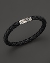 A sterling silver bamboo pushlock is a bold finish to this braided leather bracelet from the John Hardy Bamboo Collection.