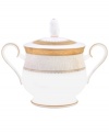 Noritake makes any occasion memorable with the opulent Odessa Gold sugar bowl. Wide bands of etched gold and pale gray with delicate blooms adorn the classic bone china design.